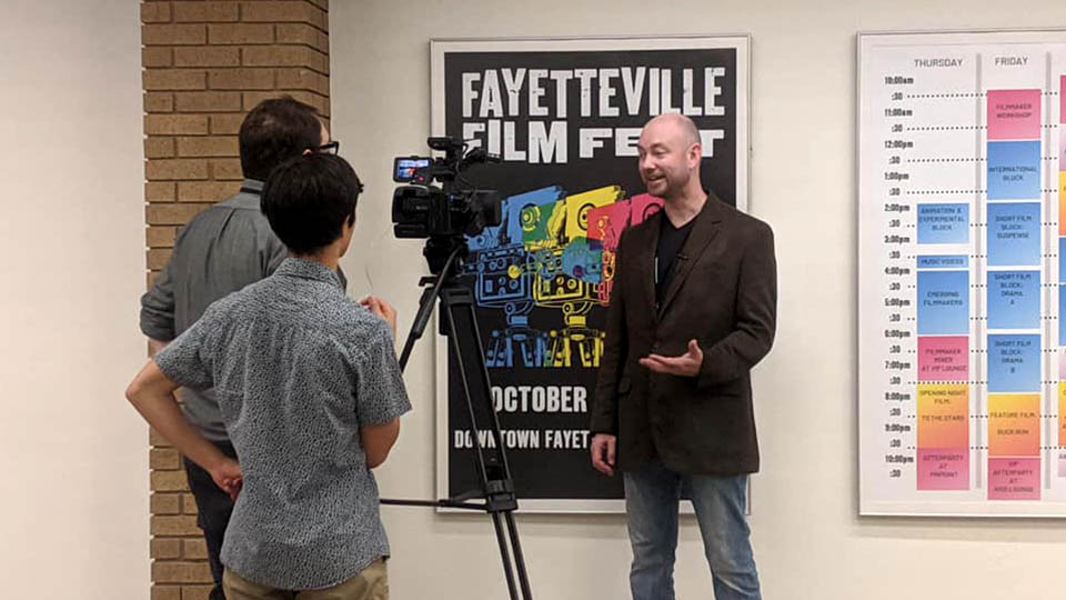 A photo of me interviewing Dan Robinson for the 2019 Fayetteville Film Fest Recap video